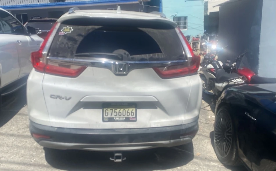 jeepeta Honda CRV blanca, placa G756066