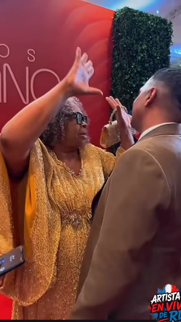 Martha Candela y Santiago matias en premios soberanos