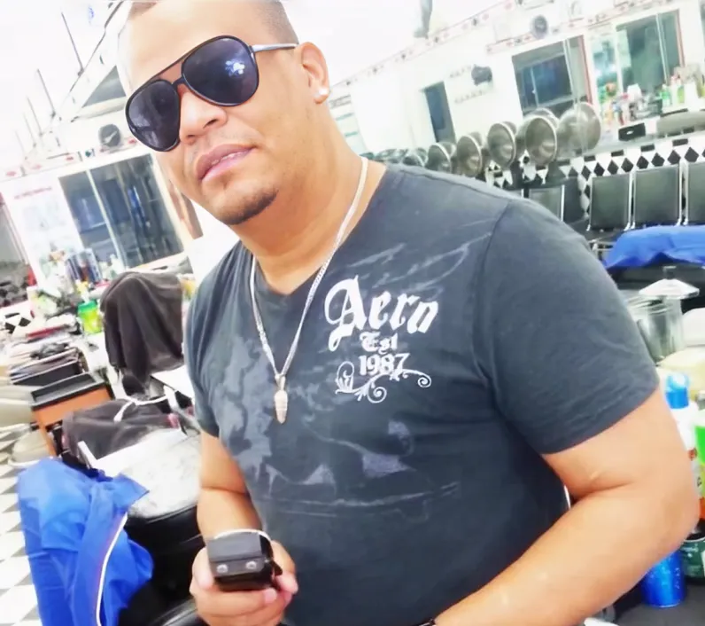 barbero dominicano, identificado por el apodo de "Conga"